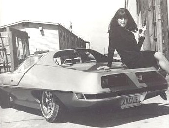 Actress Stephanie Powers sits on the rear deck of the Piranha.